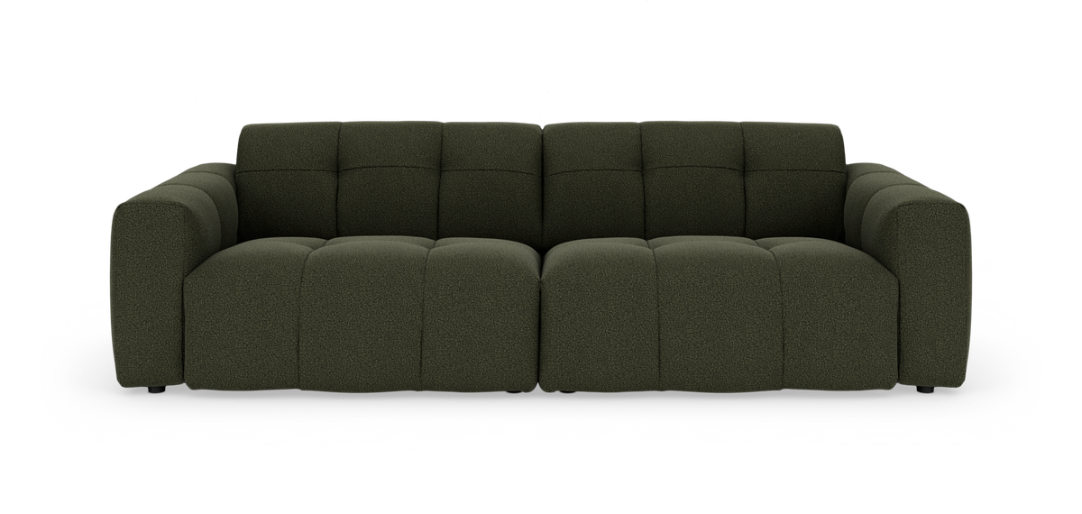 Mørkegrøn modulsofa med bløde, fyldige sædesektioner og rundede armlæn, set forfra mod hvid baggrund.