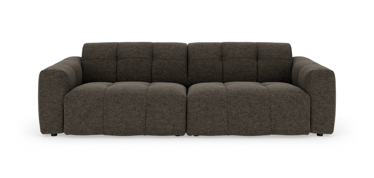 Mørkegrå modulsofa med brede armlæn, fotograferet lige for mod hvid baggrund.