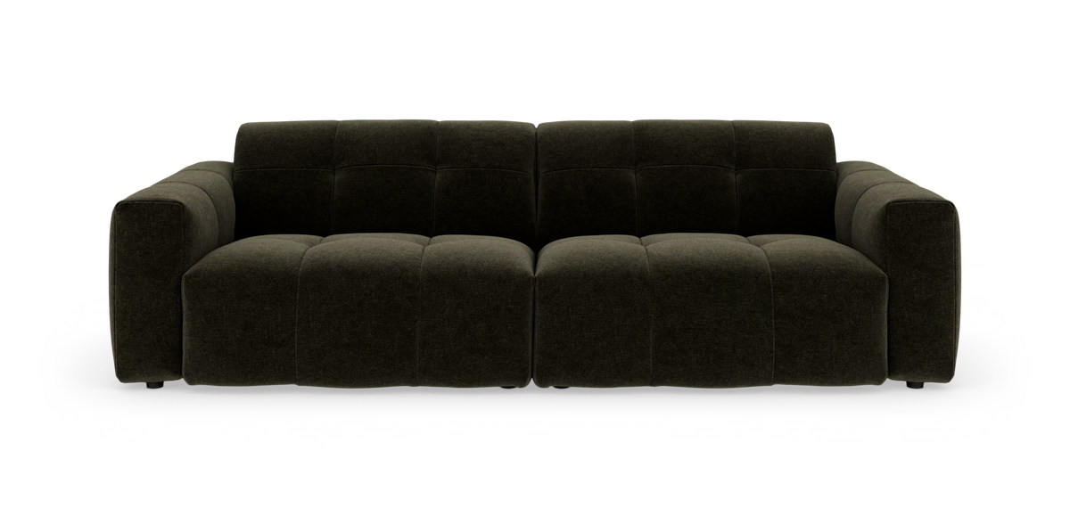 Mørkegrøn modulsofa set forfra på hvid baggrund.