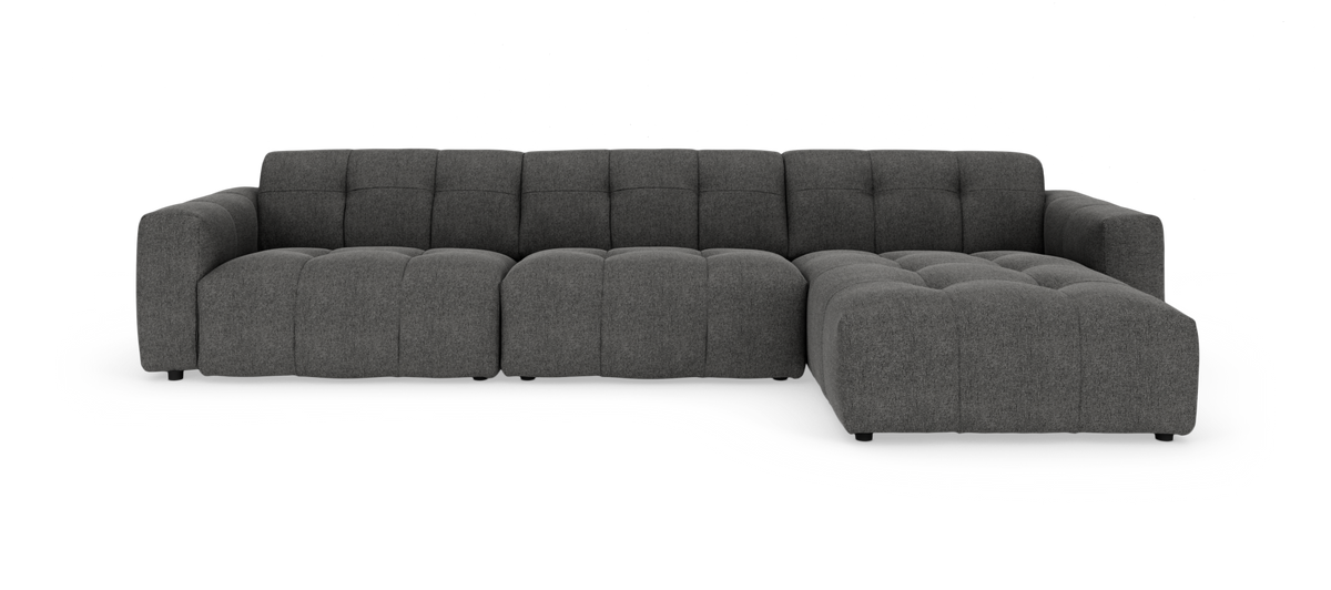 Mørkegrå modulsofa med chaiselong til højre, fritlagt på hvid baggrund.