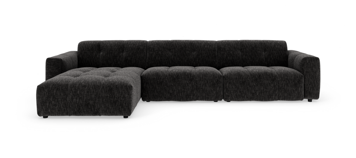 Mørk grå modulsofa med venstrevendt chaiselong på hvid baggrund.