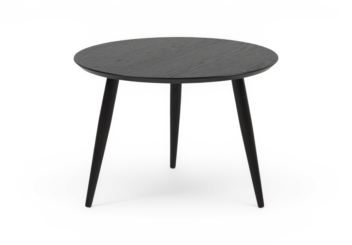 Rundt sort sidebord med tre slanke, tilspidsede ben.