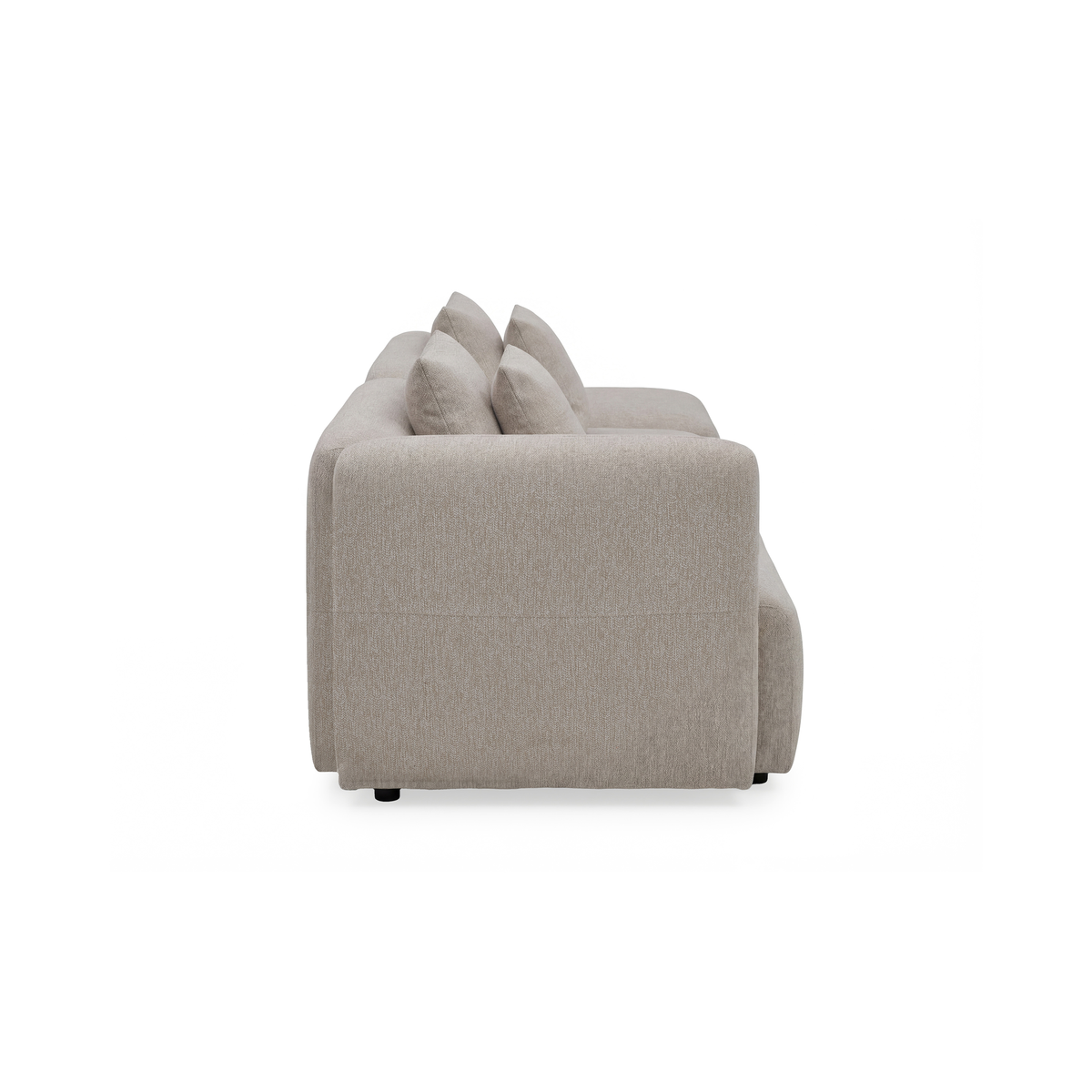 Beige stofsofa set fra siden med flere ryghynder på hvid baggrund.