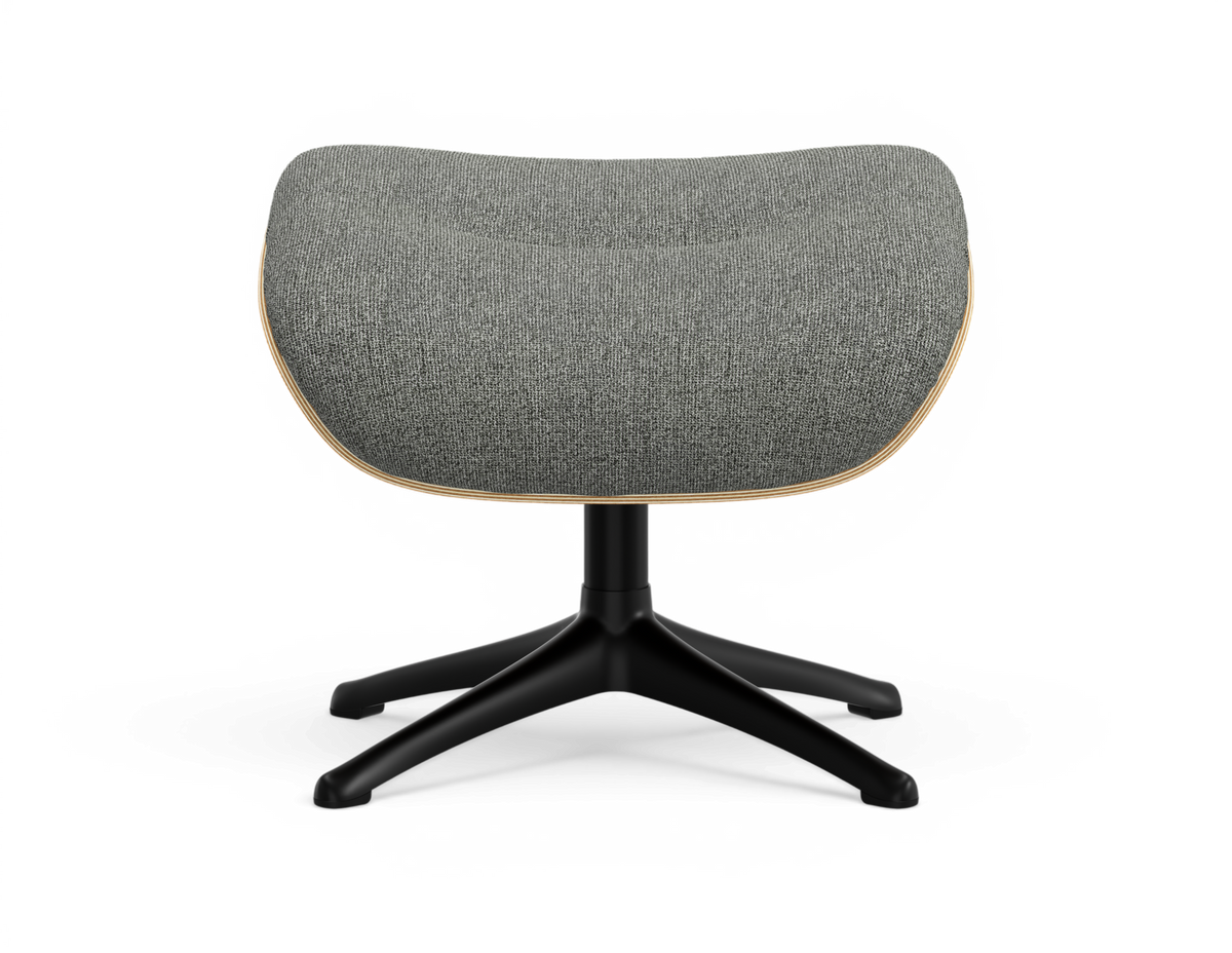 Grå polstret fodskammel med sort firestjernet base, frontvisning i studie.