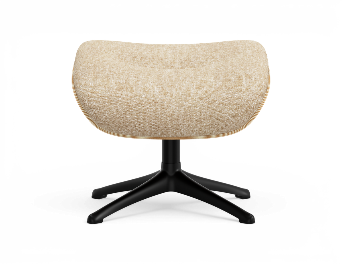 Beige fodskammel i tekstil med sort firebenet krydsfod, fritlagt på hvid baggrund.