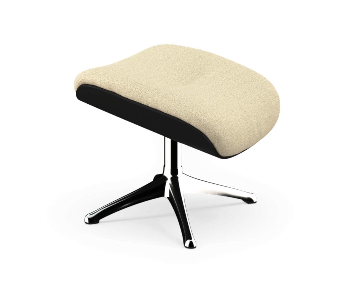 Beige fodskammel med sort kant og forkromet firestjernet base, fritlagt.