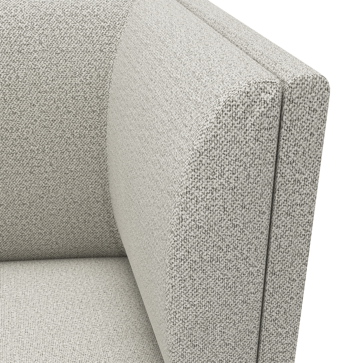 Nærbillede af lysebeige sofa-armlæn i boucléstof.