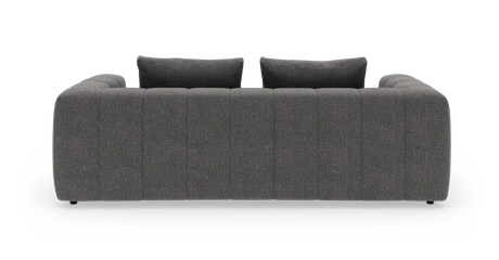 Mørkegrå, moderne 3-personers sofa med to ryghynder, fotograferet lige forfra på hvid baggrund.