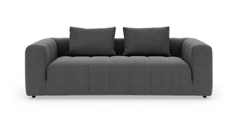 Mørkegrå 3-personers sofa med to puder, afrundede armlæn og lodrette panel-syninger, frilagt på hvid baggrund.