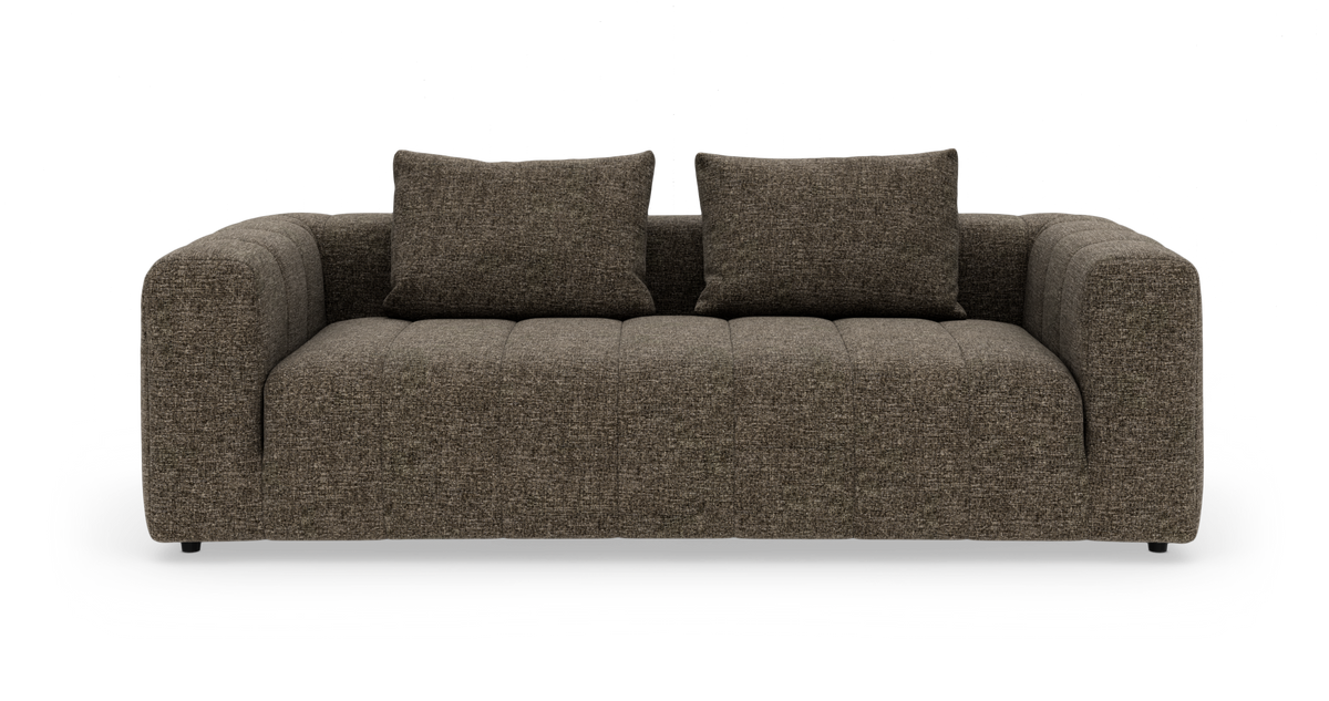 Brun, moderne 3-personers sofa med to rygpuder, fotograferet lige for fra hvid baggrund.