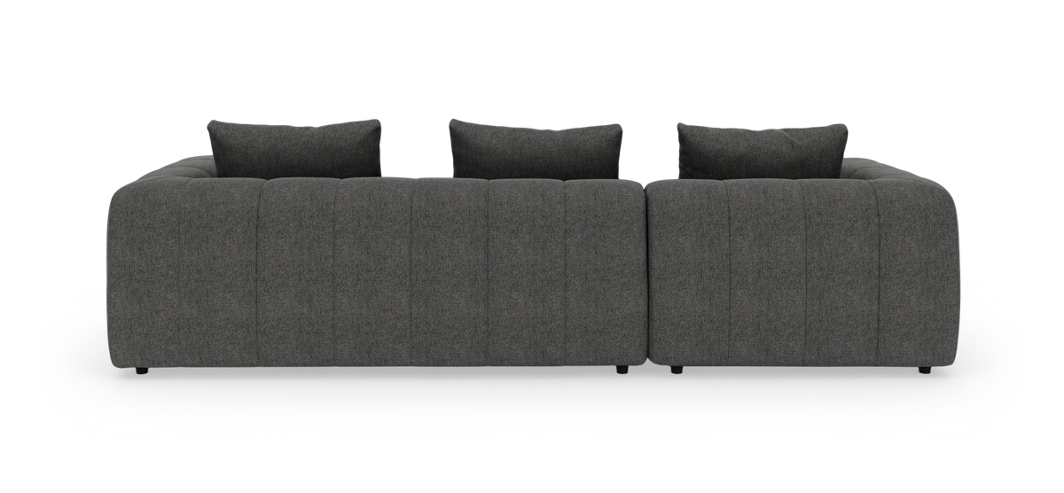 Mørkegrå modulsofa set forfra med tre ryghynder.