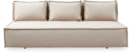 Beige modulsofa med tre rygpuder, frilagt på hvid baggrund.