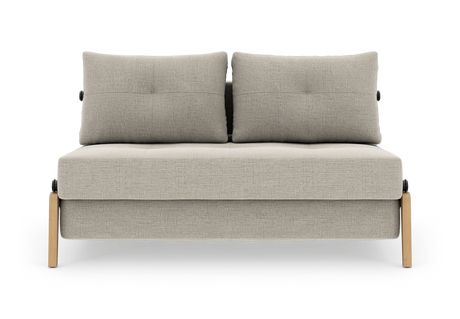 Beigefarvet 2-personers sofa med to ryghynder, frilagt på hvid baggrund, set forfra.