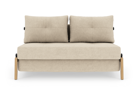 Beige 2-personers sofa med to ryghynder og lyse træben, frontvisning på frilagt hvid baggrund.