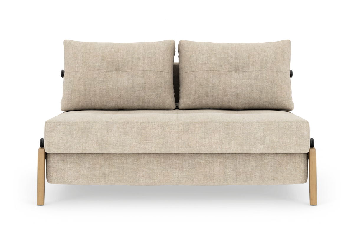 Beige 2-personers modulsofa med to ryghynder og lyse træben, set forfra.