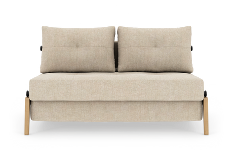 Beige 2-personers modulsofa med to ryghynder og lyse træben, set forfra.