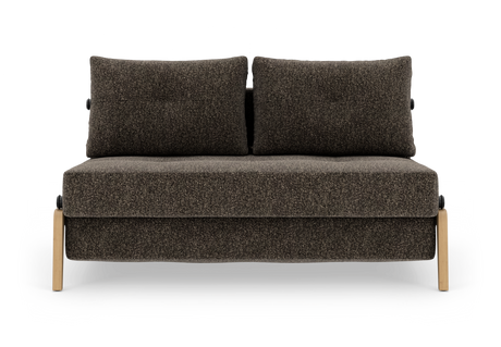 Mørkebrun 2-personers sofa med to løse ryghynder og lyse træben, fotograferet lige forfra på hvid studiobaggrund.