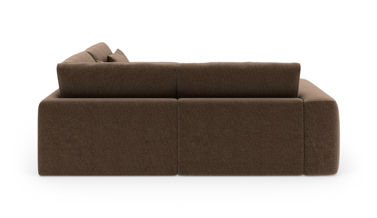 Modulær brun stofsofa set bagfra i studie på hvid baggrund.