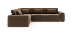 Brun modulsofa i hjørneudgave med tykke sæder og puder, frilagt på hvid baggrund.