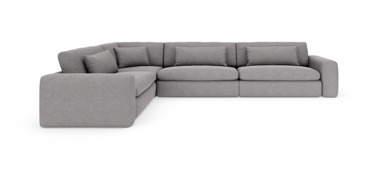 Lysegrå modul-hjørnesofa med afrundede armlæn og fem ryghynder, frilagt på hvid baggrund.