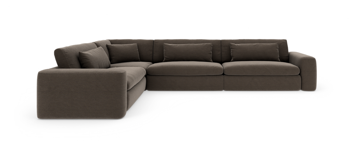 Mørkebrun modul-hjørnesofa med afrundede armlæn og løse ryghynder, fritlagt på hvid baggrund.