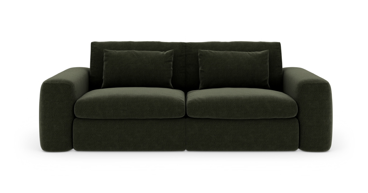 Mørkegrøn 2-personers sofa med afrundede armlæn og løse ryghynder, frilagt på hvid baggrund.