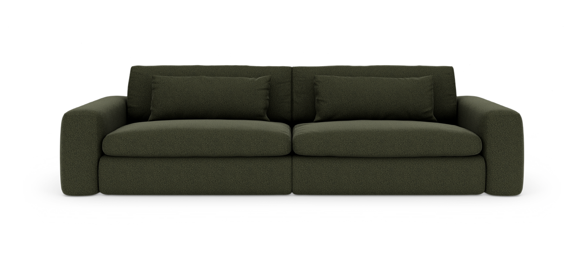 Mørkegrøn, moderne 3-personers sofa med to ryghynder, frilagt på hvid baggrund.