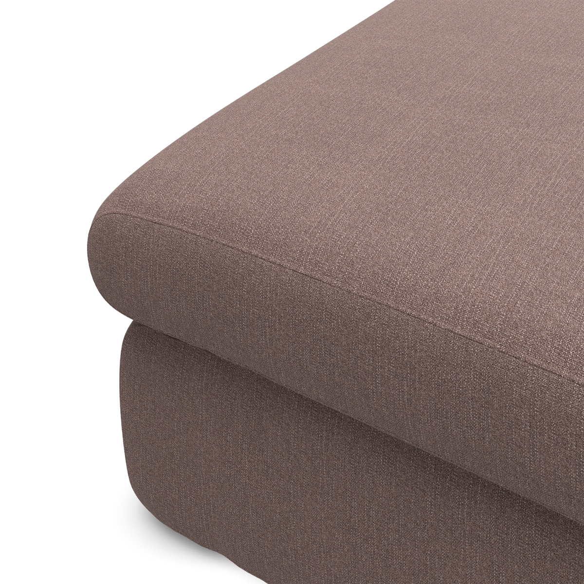 Nærbillede af hjørne på brunbeige stofsofa i studie.