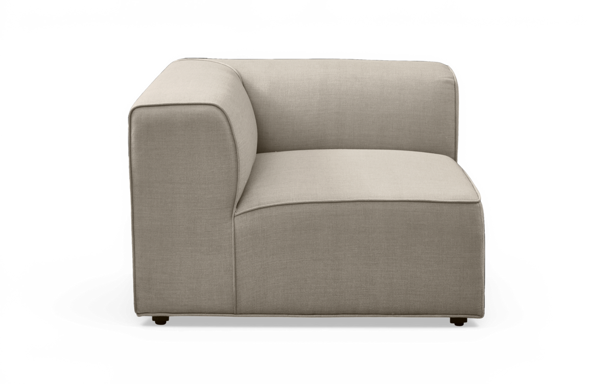 Beige hjørnemodul til modulsofa i stof, set fra siden på hvid baggrund.