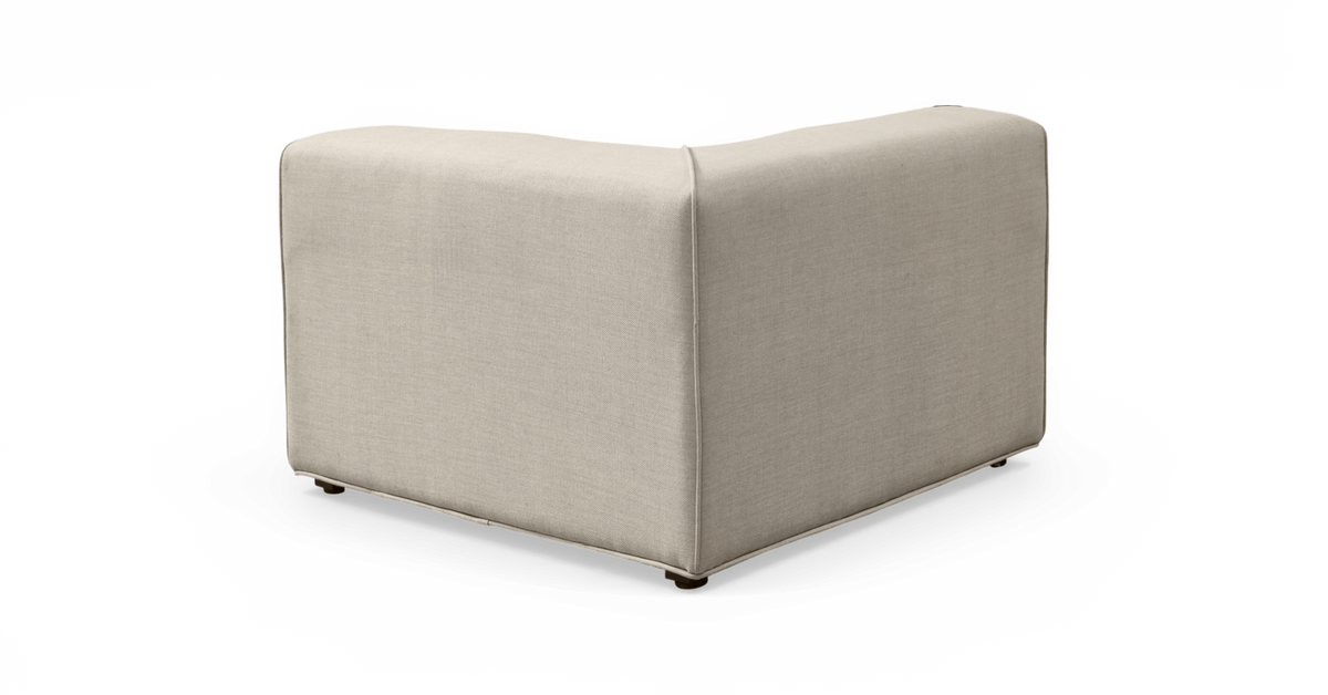 Beige modulsofa hjørnemodul i stof, frilagt produktbillede.