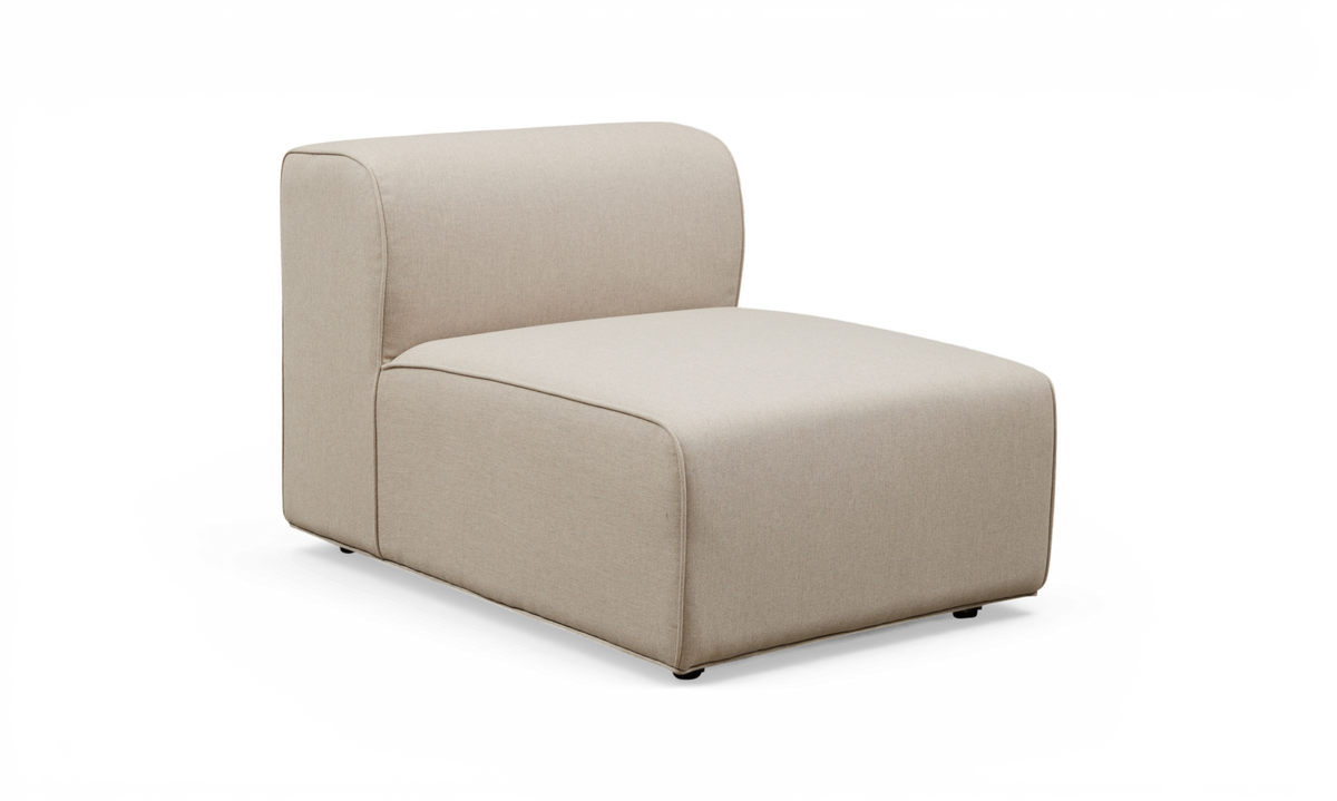 Beige modulsofa, armløs loungedel med afrundede kanter på hvid baggrund.