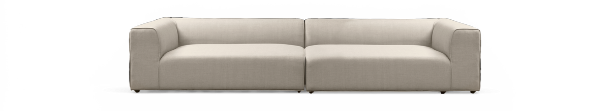 Moderne beige 2-personers sofa med afrundede hjørner, frilagt mod sort baggrund i frontvisning.