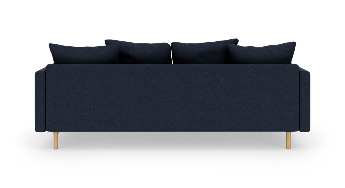 Mørkeblå sofa set bagfra med lyse træben på hvid baggrund.