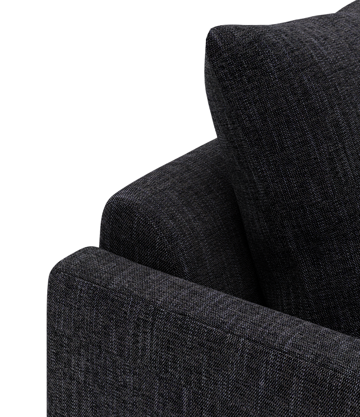 Detalje af mørkegrå stofsofa med pude mod sort baggrund.