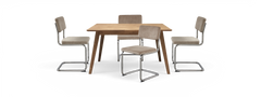 Spisesæt med rektangulært træbord og fire beige polstrede stole med kromede cantilever-ben.