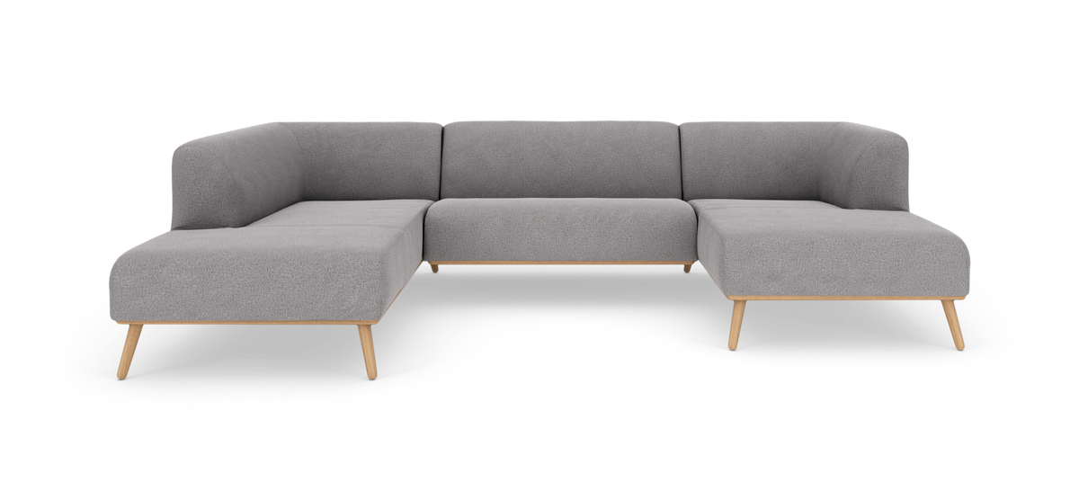 Grå modulsofa i U‑form med træramme og koniske ben, frilagt på hvid baggrund.