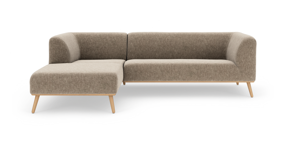 L-formet modulsofa i beige stof med træben, venstrevendt chaiselong.
