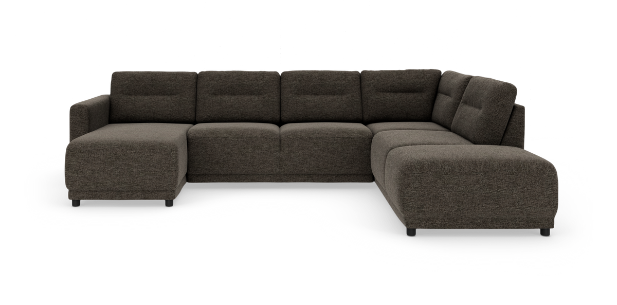 Mørkegrå modulsofa i U‑form med chaiselong til venstre og afrundet hjørnemodul til højre, frilagt mod hvid baggrund.