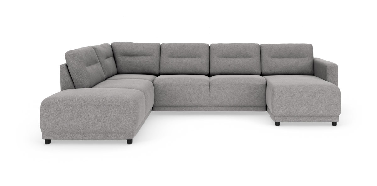 Lysegrå modulhjørnesofa i U‑form med chaiselong til højre, frilagt på hvid baggrund.