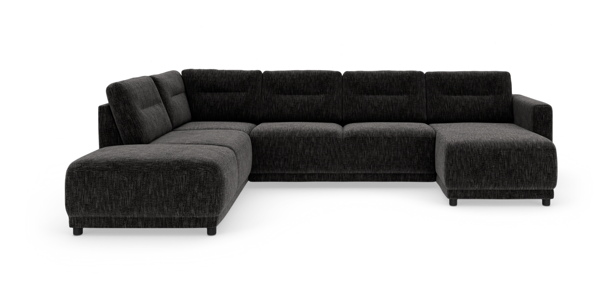 Mørkegrå modul-hjørnesofa med chaiselong til højre og bred åben afslutning til venstre, fritstående på hvid baggrund.