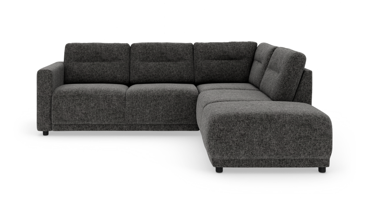 Mørkegrå L-formet modulsofa med chaiselong til højre i stof.