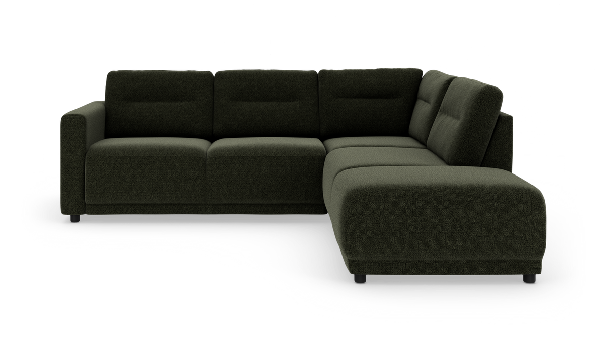 Mørkegrøn modulsofa i L‑form med chaiselong til højre, fritstående på hvid baggrund.