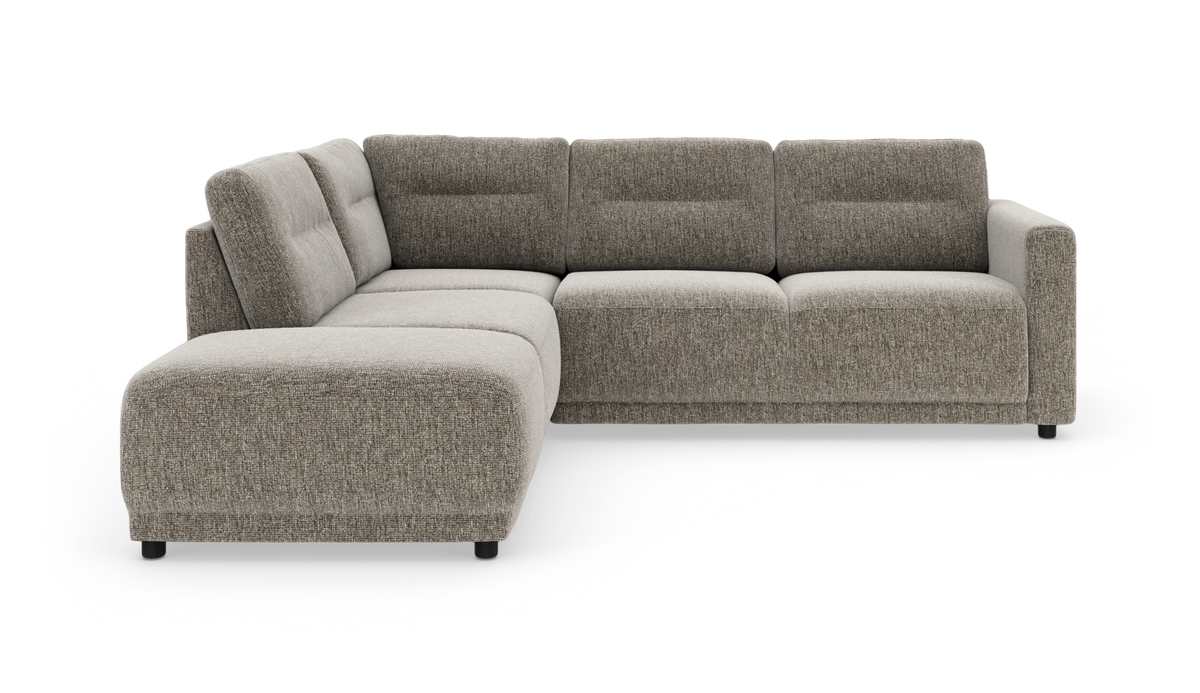 L‑formet modulsofa i grå‑beige stof med venstrevendt chaiselong, kraftige sæder og lave sorte ben.