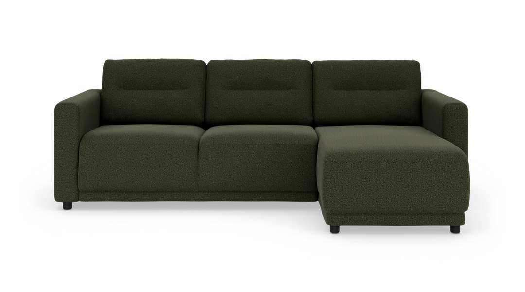 Mørkegrøn modulsofa med chaiselong til højre, set forfra mod hvid baggrund.