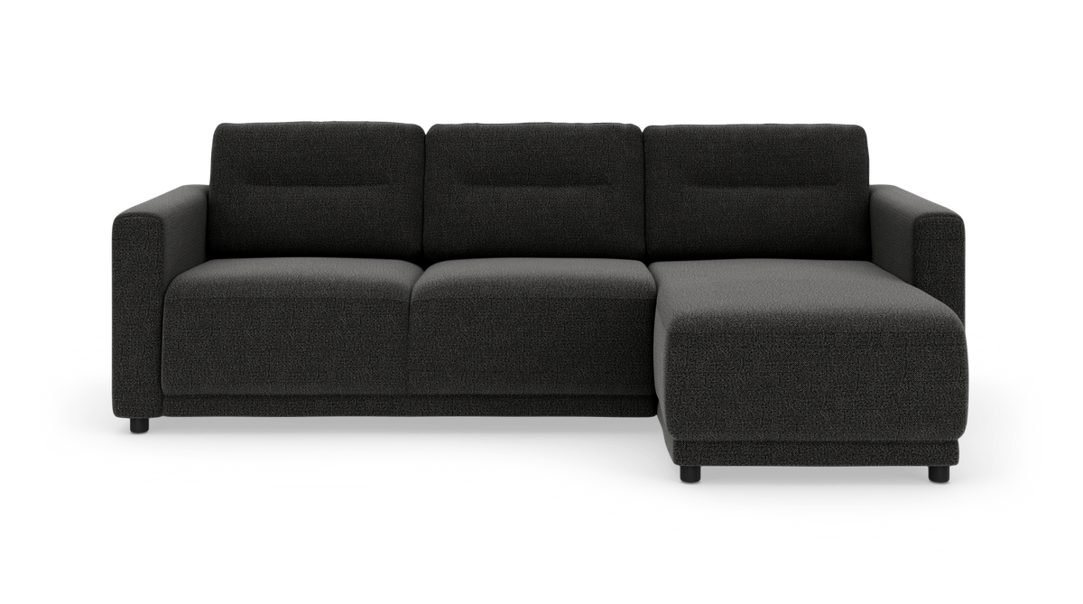 Mørkegrå hjørnesofa med højrevendt chaiselong i studioopsætning, set forfra.