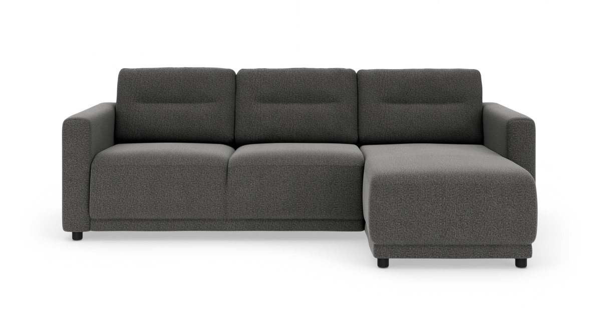 Mørkegrå hjørnesofa med chaiselong på højre side, frilagt på hvid baggrund.