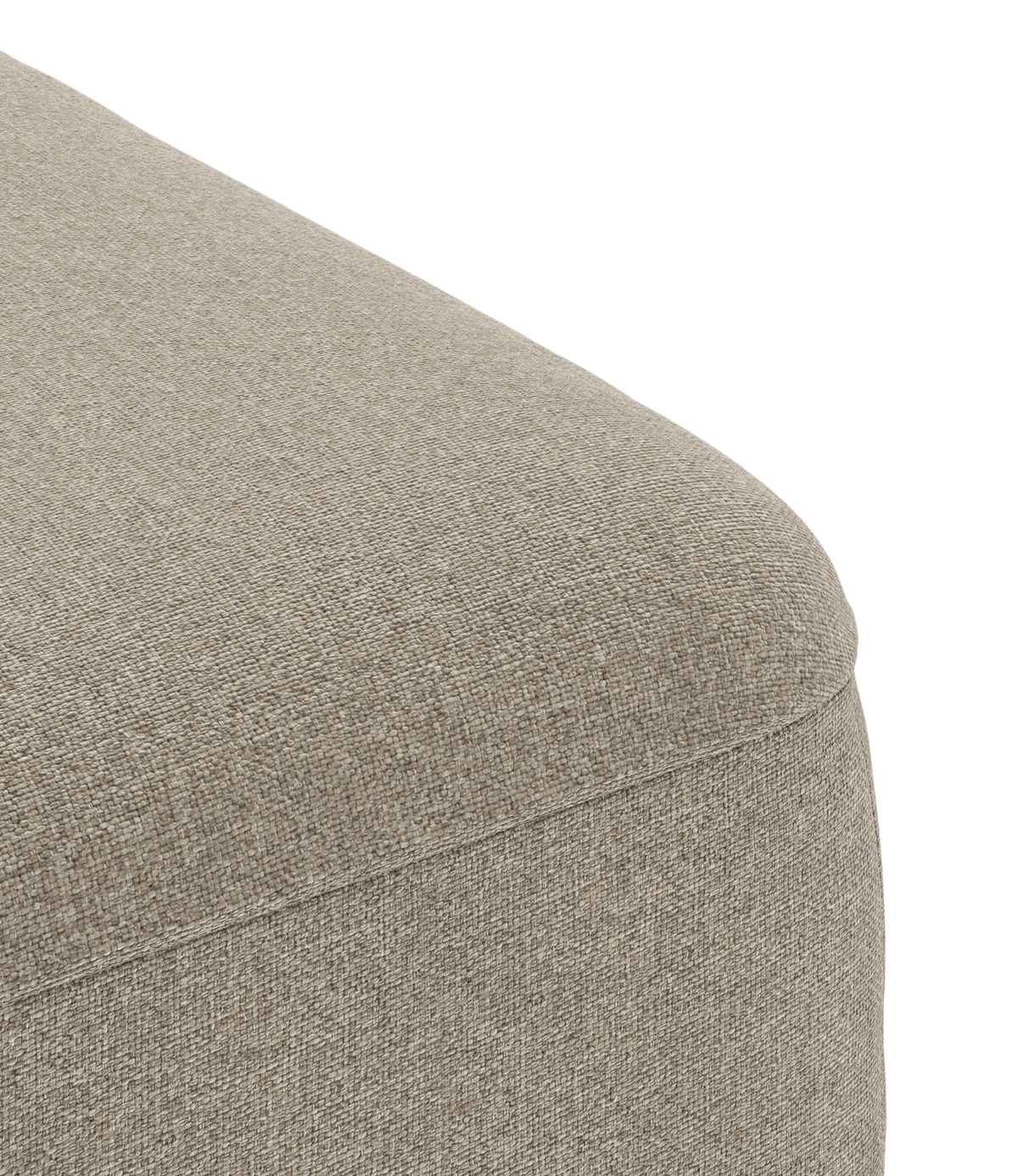 Nærbillede af et beige, afrundet hjørne på en stofbetrukket puff/sofamodul.