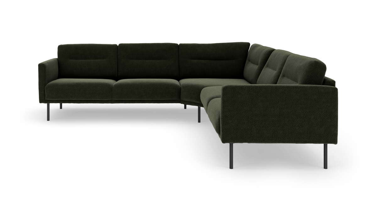 Mørkegrøn modulsofa i hjørneopstilling med slanke metalben, frilagt på hvid baggrund.