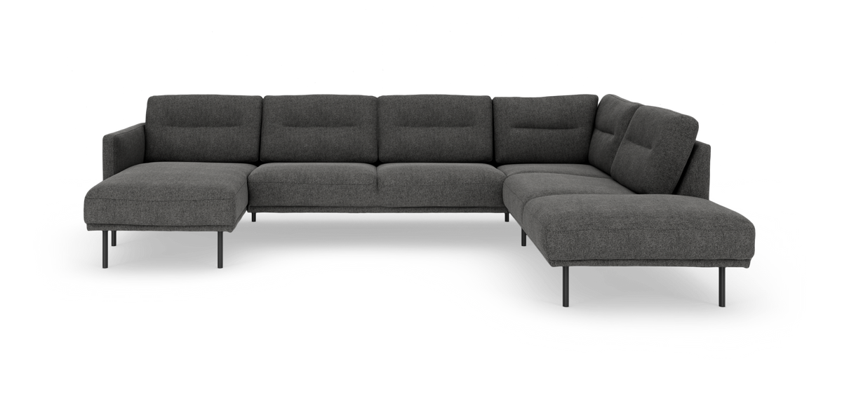 Mørkegrå U‑formet modulsofa i tekstil på hvid baggrund med slanke ben.