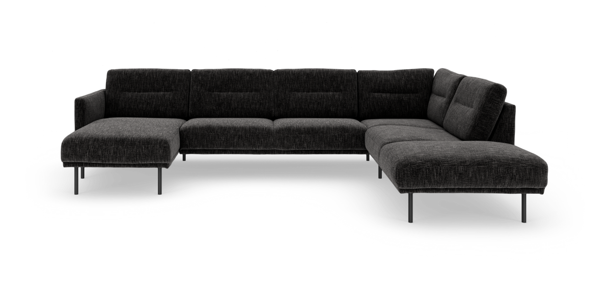 Mørkegrå modulsofa i U‑form med chaiselong, frilagt på hvid baggrund.